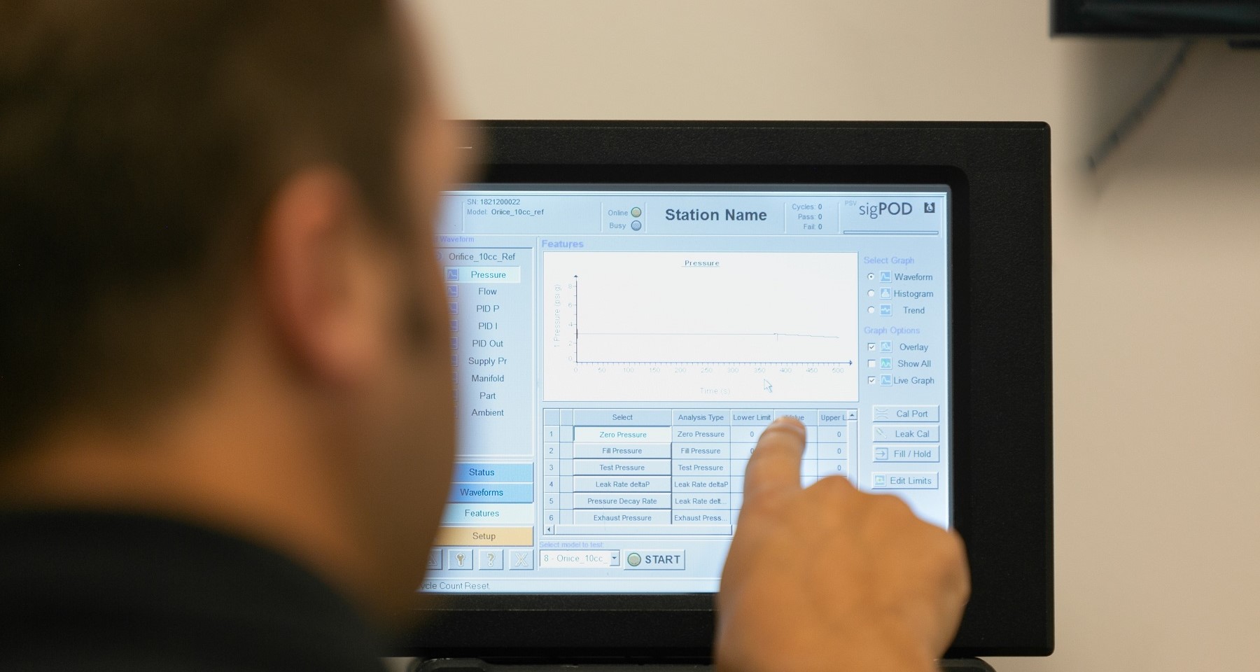 Sciemetric staff reviewing process data on screen